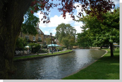 River Windrush flowing through the Cotswolds village of Bourton-on-the-Water